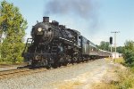 Westbound excursion eases past Cardigan Junction